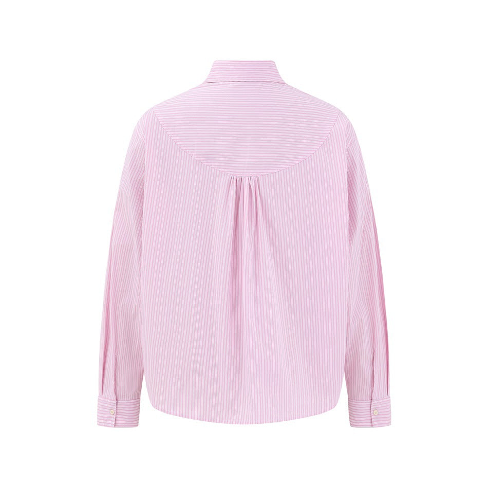 Back view of a pink-and-white striped long-sleeve shirt with a curved yoke and center pleat.