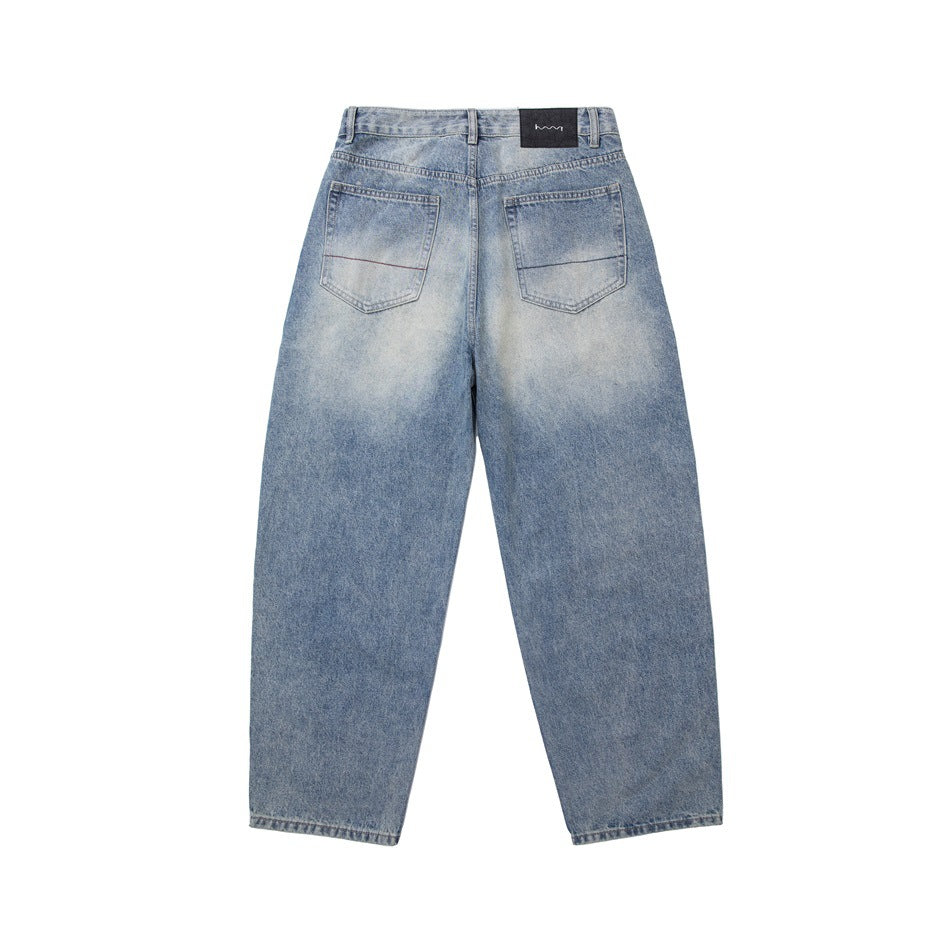 Back of light-blue faded jeans with two patch pockets and a small dark waistband patch, shown flat on white