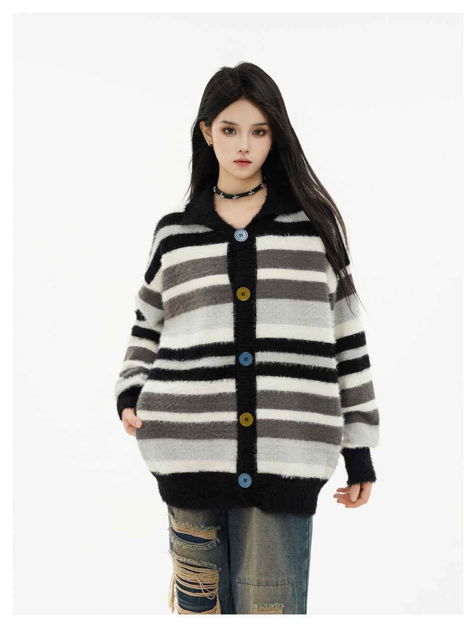 Model wearing the striped fuzzy-knit button cardigan with a choker and distressed jeans, hand in pocket