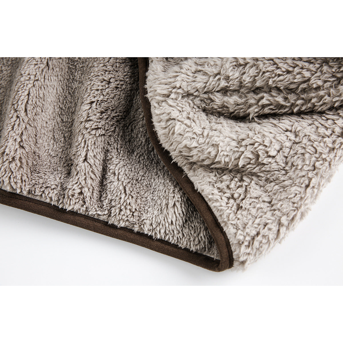 Close-up of the sweatshirt's thick plush interior and brown edge binding.