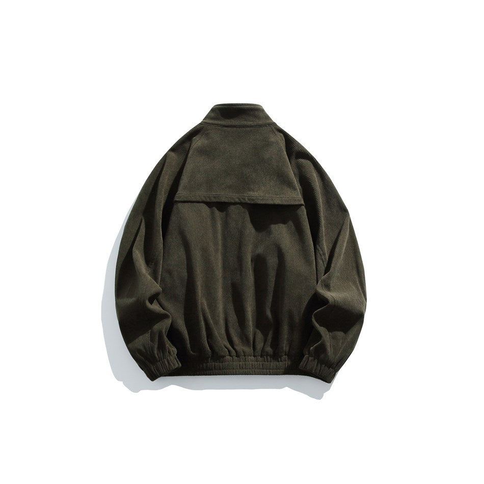 Back view of dark green ribbed stand-collar jacket with yoke overlay panel and elastic cuffs and hem