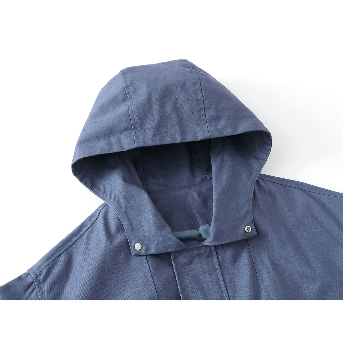 Close-up of a blue hooded jacket showing its large hood, snap fasteners, and covered front closure.