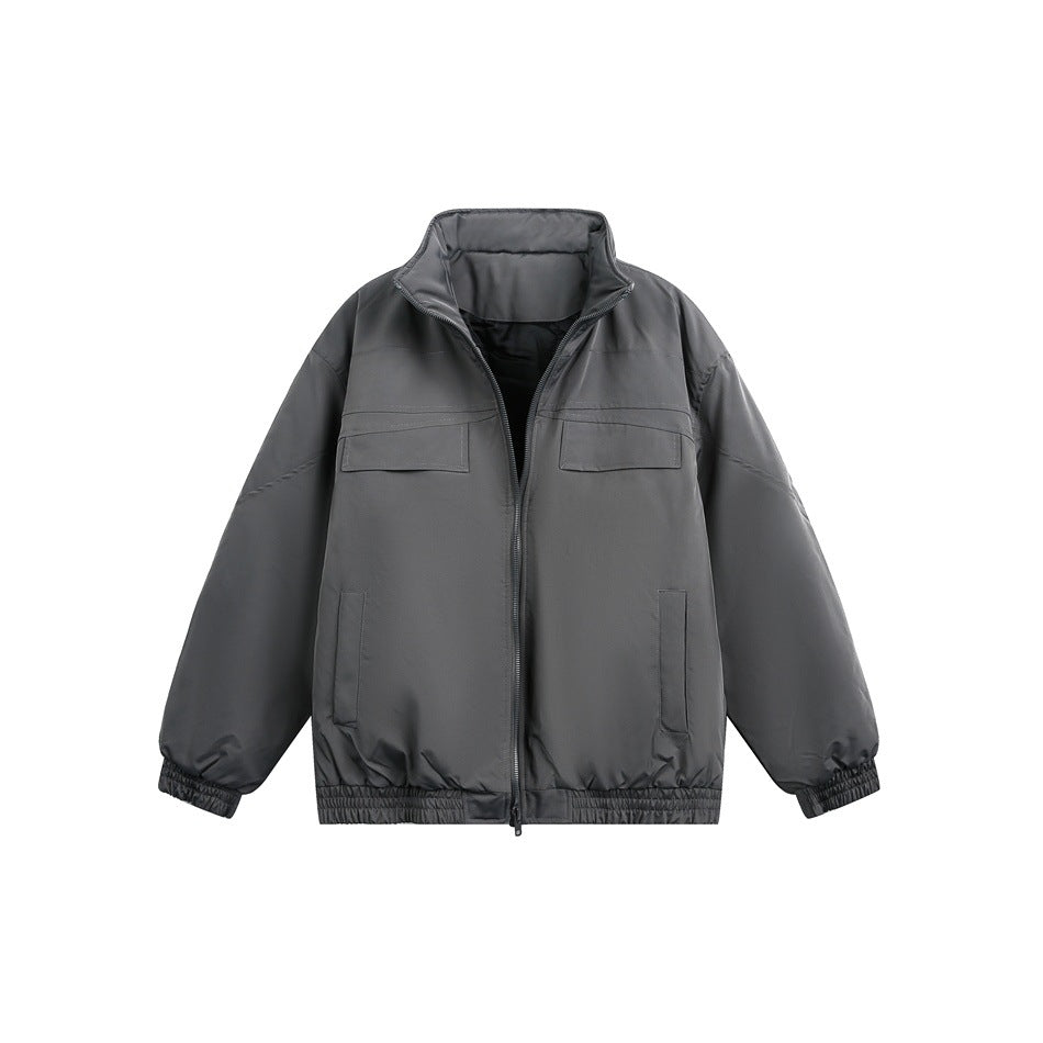 Gray stand-collar zip jacket with chest flap pockets, front slip pockets and elastic cuffs and hem, flat front view