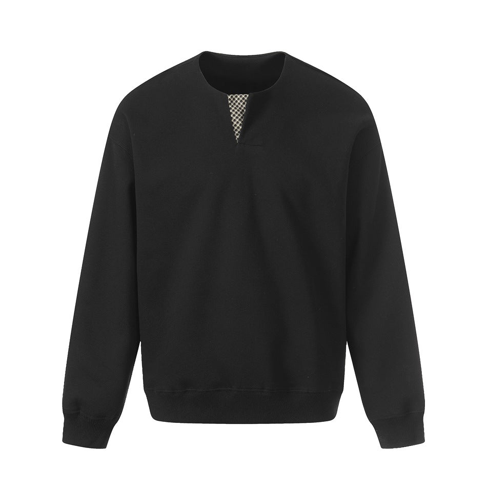 Black pullover sweatshirt flat lay with notched round neck, checked insert, ribbed cuffs and hem