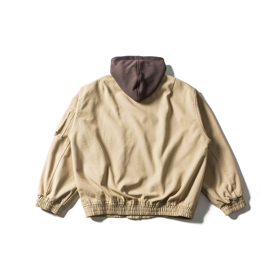 Back view of a beige jacket with a brown hood, elastic cuffs, and an elasticized hem.