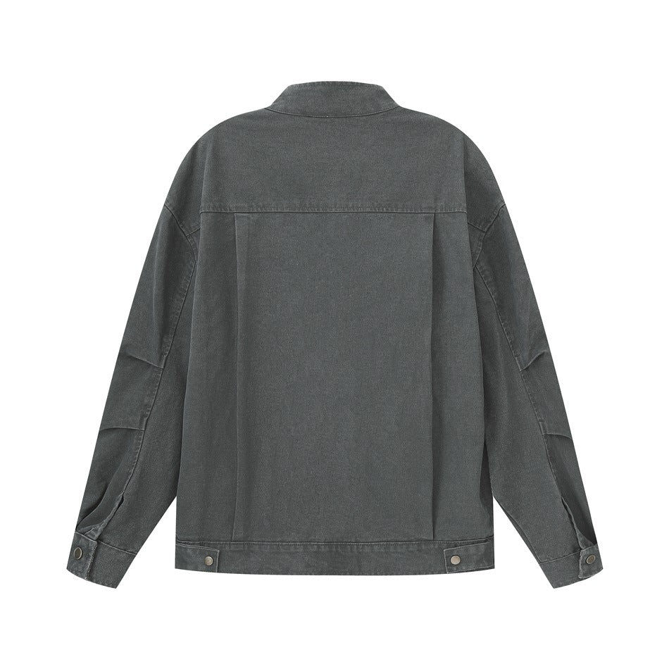Back view of a charcoal gray jacket with a stand collar, long sleeves, and snap details at the cuffs and hem.