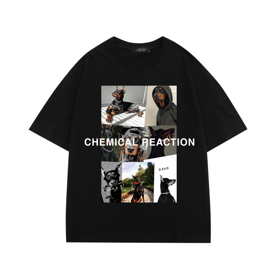 Black short-sleeve T-shirt with a Doberman photo collage and white CHEMICAL REACTION text on the front