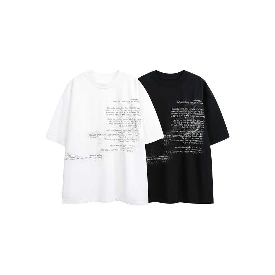 Front view of oversized white and black short-sleeve T-shirts with distressed English text prints.