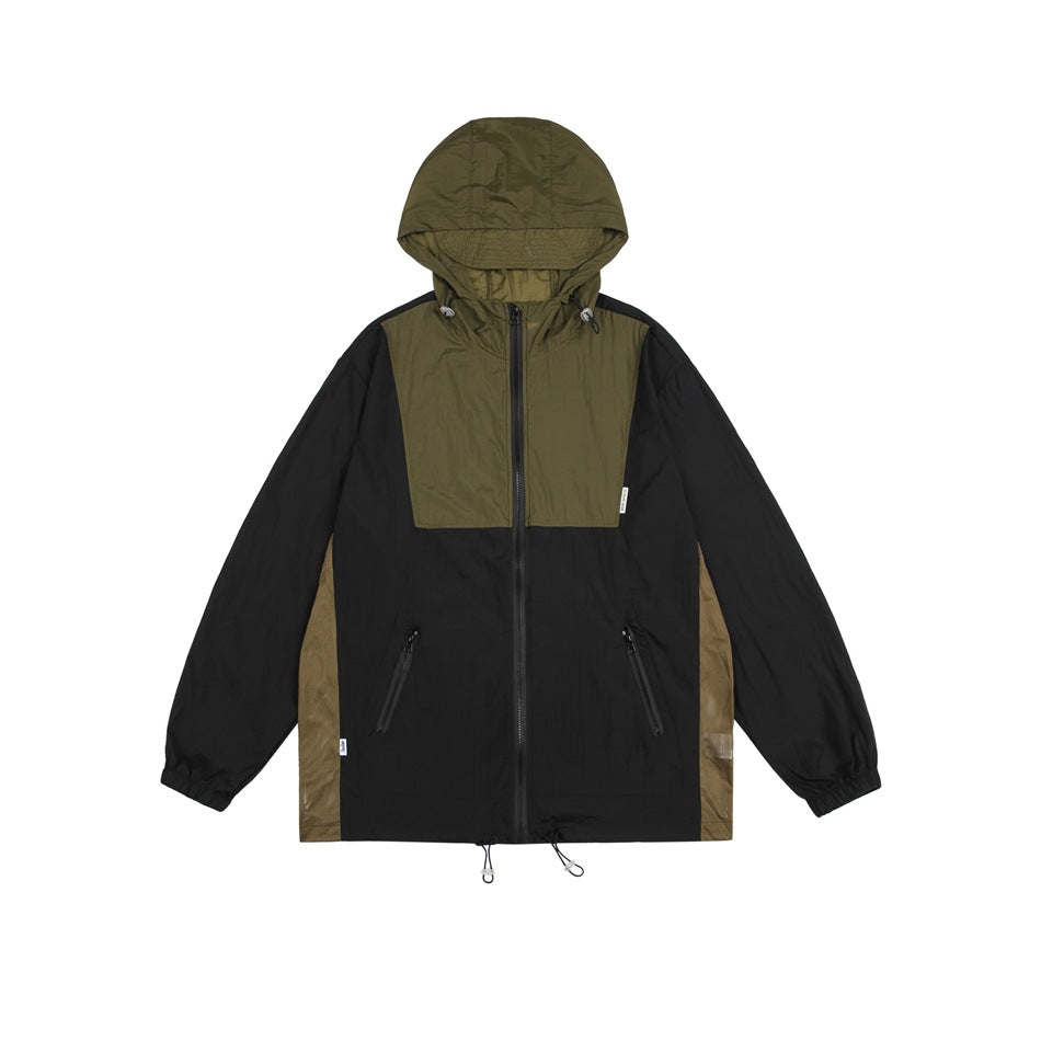 Black hooded zip jacket with olive green chest panel, hood and side panels, zippered pockets and hem drawcord, flat lay