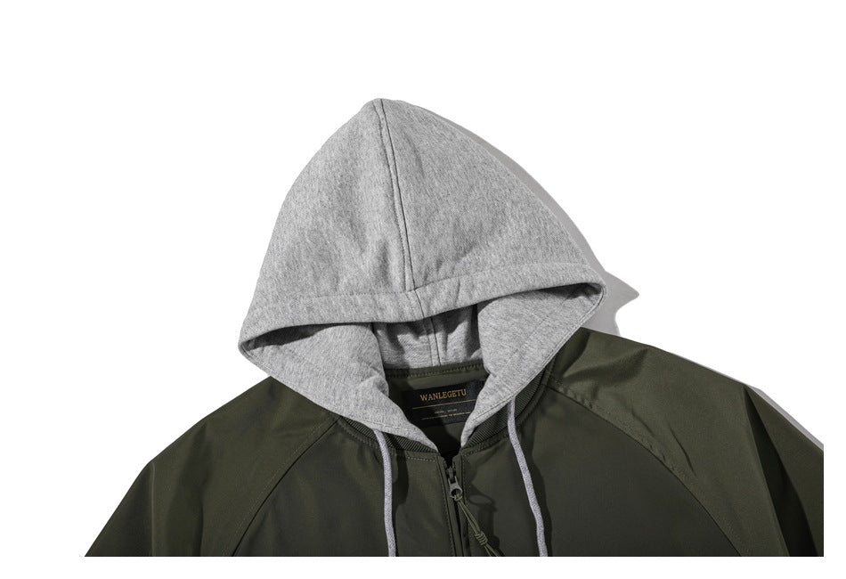 Close-up of the olive jacket's gray hood, drawstrings, collar, zipper, and inside neck label.