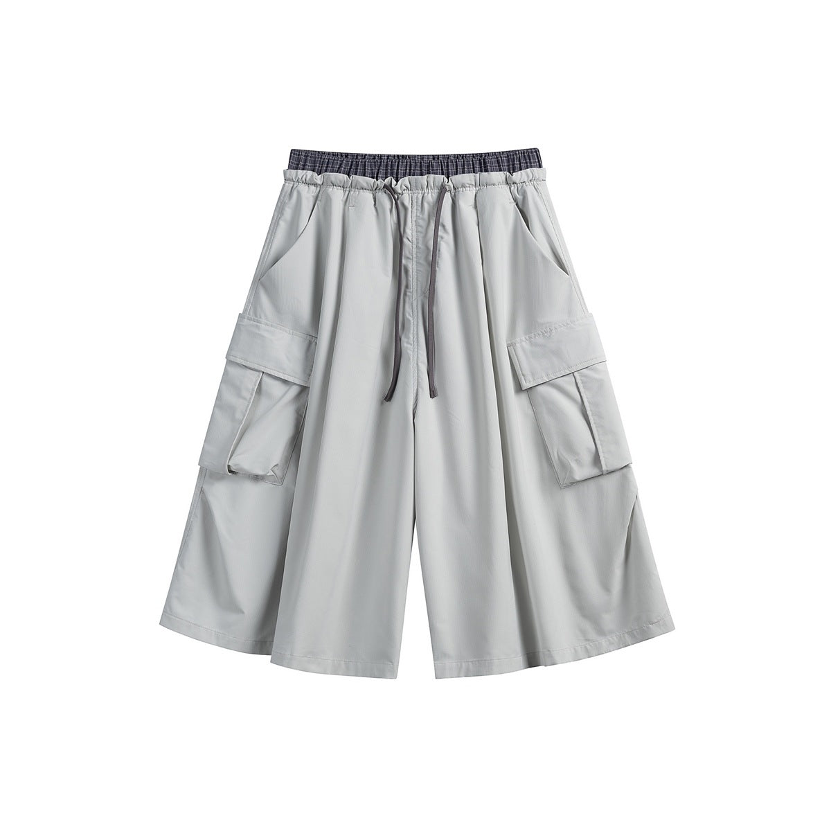 Light gray knee-length wide-leg cargo shorts with drawstring, dark plaid inner waistband and large side pockets