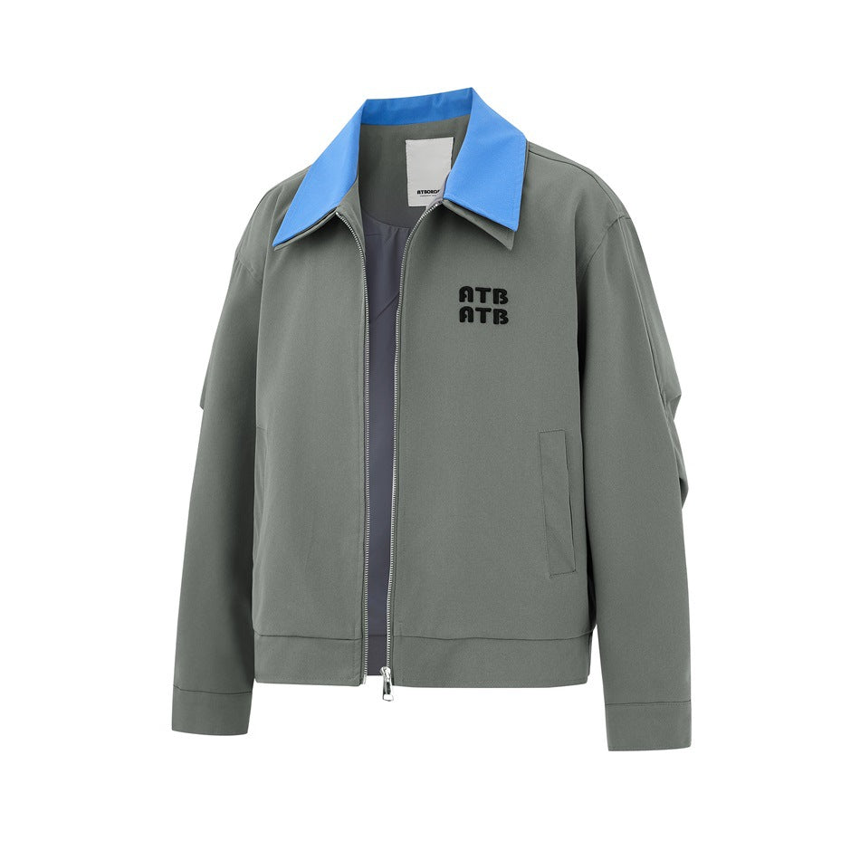 Gray-green jacket with blue collar, partly unzipped to show dark gray inner layer, angled front view