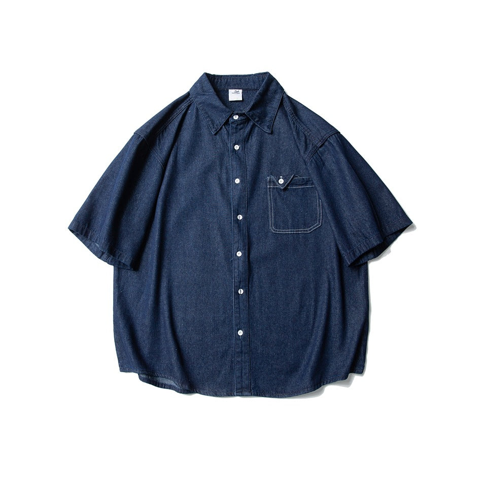 Dark blue short-sleeve denim button-up shirt, flat front view with chest pocket and white buttons