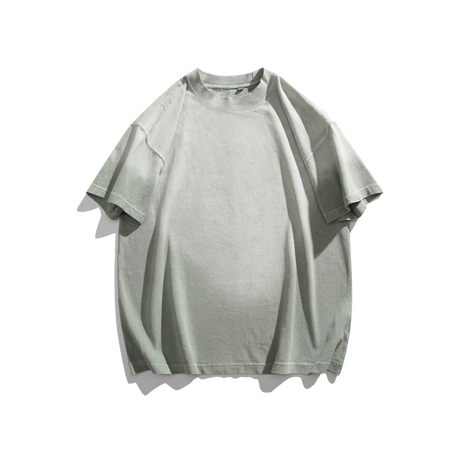Light green drop-shoulder short-sleeve T-shirt with soft faded wash, flat lay front view