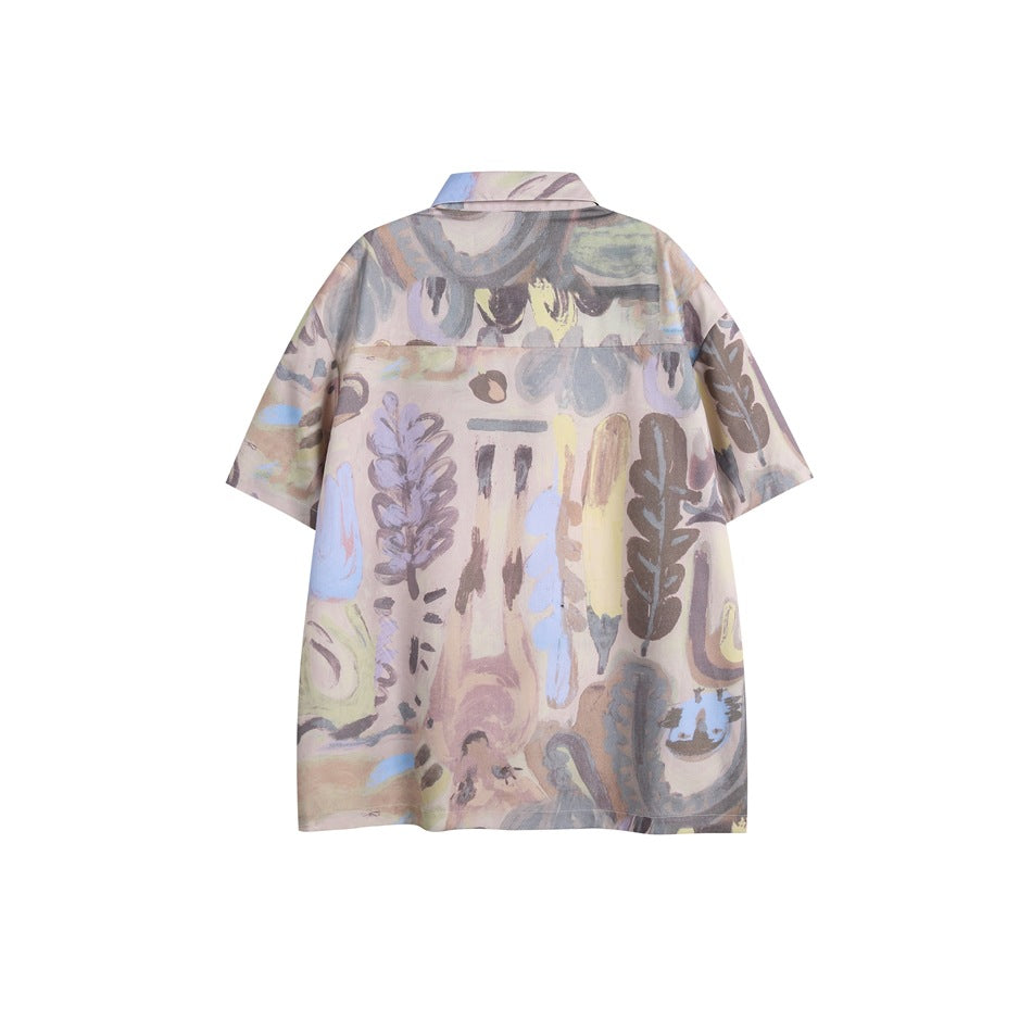 Back view of a pale pastel short-sleeve button-up shirt with an allover abstract print.