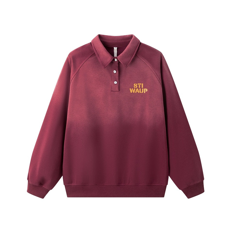 Red washed-gradient polo-collar sweatshirt with raglan sleeves, button placket and orange chest print, flat lay front