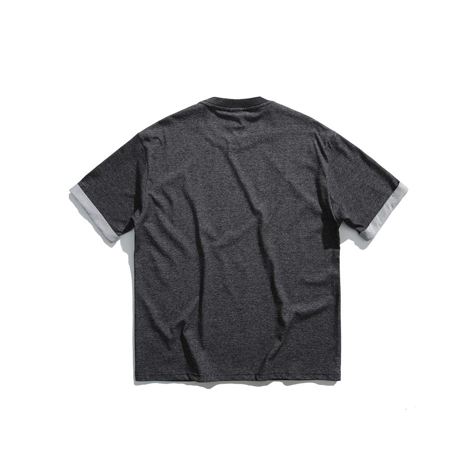 Back view of a black heathered crew-neck T-shirt with a plain back and rolled sleeve cuffs, flat lay