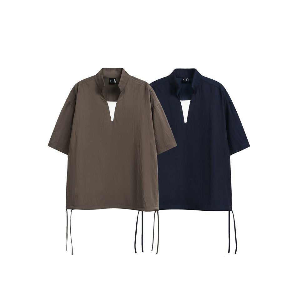 Brown and navy short-sleeve tops shown from the front, with stand collars, split necklines, and long hem ties.