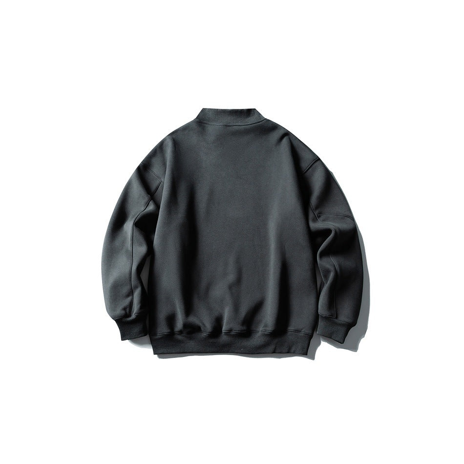 Back view of dark gray mock-neck sweatshirt with ribbed collar, cuffs and hem, flat lay