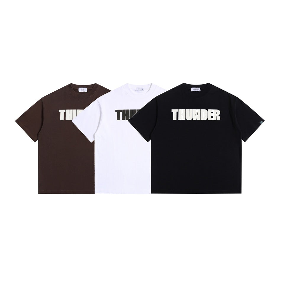 Front view of brown, white, and black short-sleeve T-shirts with large white THUNDER lettering.