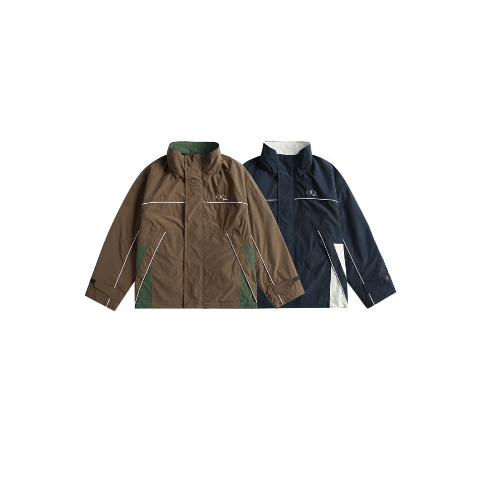 Two jackets shown from the front: one brown with green accents and one navy with white accents.