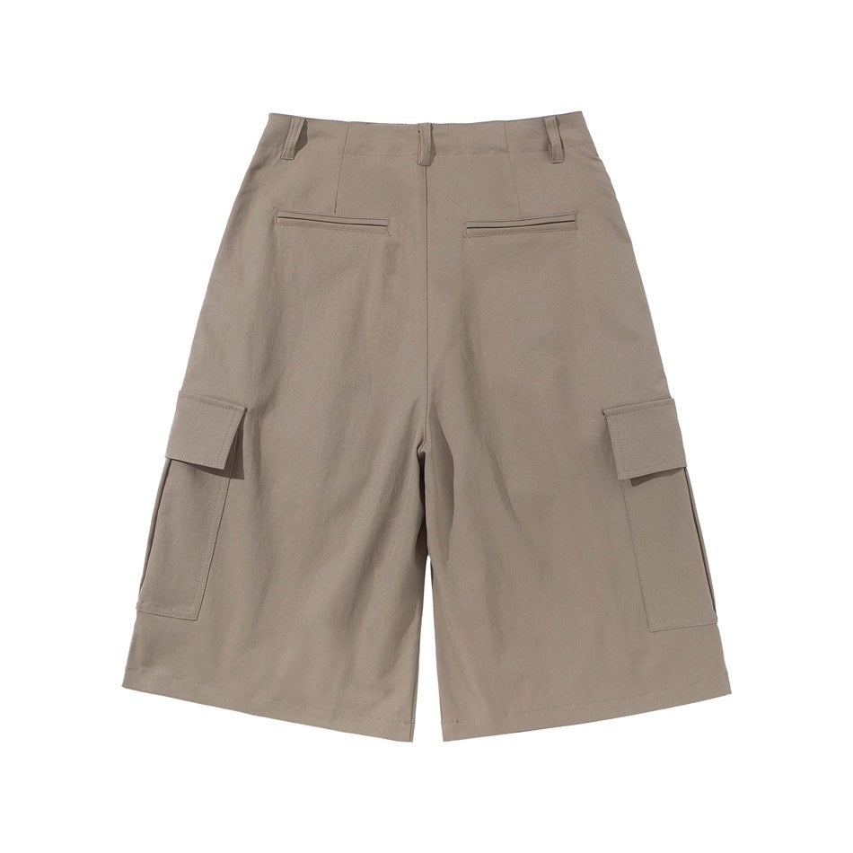 Khaki knee-length cargo shorts, flat lay back view with two welt pockets and side cargo flap pockets
