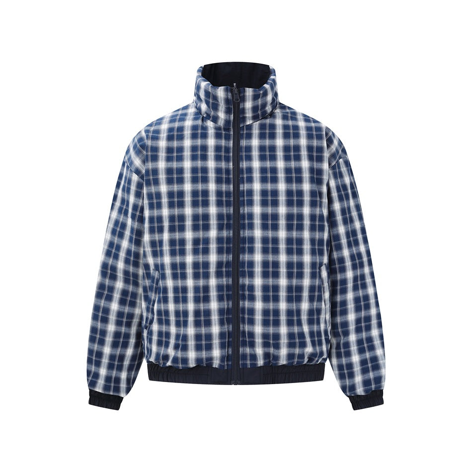Front view of a blue-and-white plaid zip-up jacket with a high collar, navy trim, elastic cuffs, and hem.