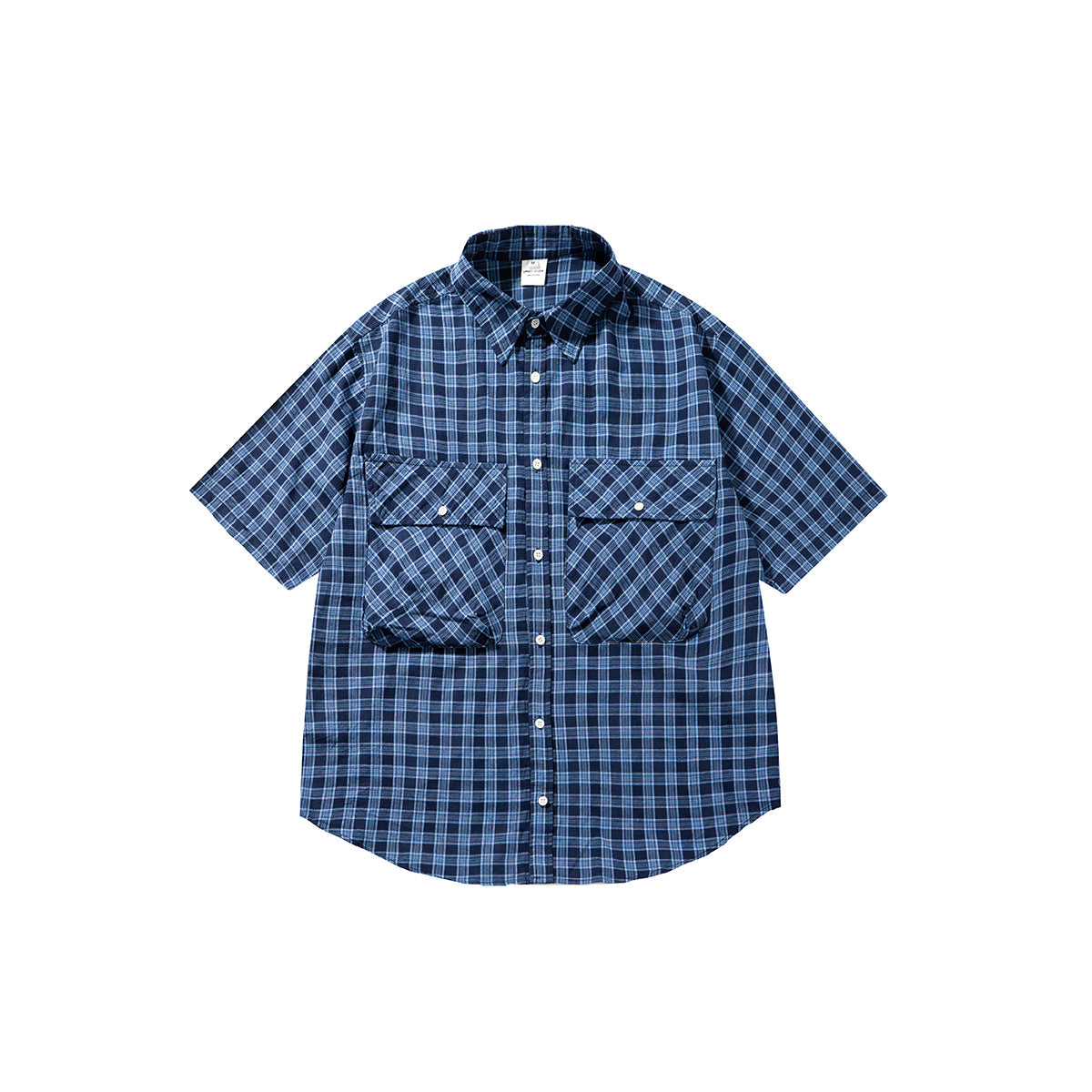 Blue plaid short-sleeve button-up shirt with two large flap chest pockets, flat lay on white background