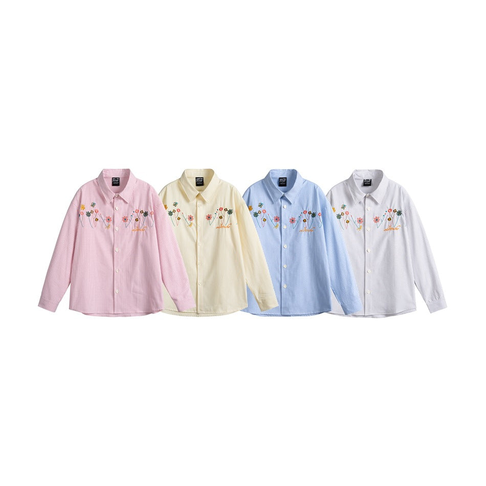 Four front-facing button-up shirts in pink, cream, light blue, and white, each with floral embroidery.