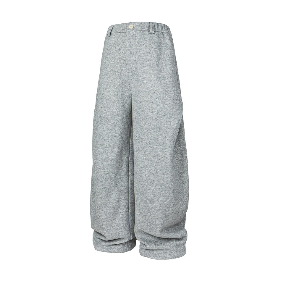 Heather gray wide-leg sweatpants with elastic waist and button, shown angled on a white background