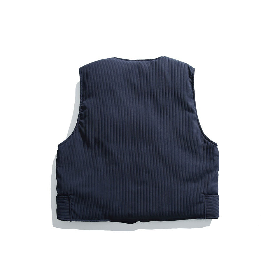 Back of a dark navy sleeveless vest with fine vertical ribs and adjustable tabs at the hem.