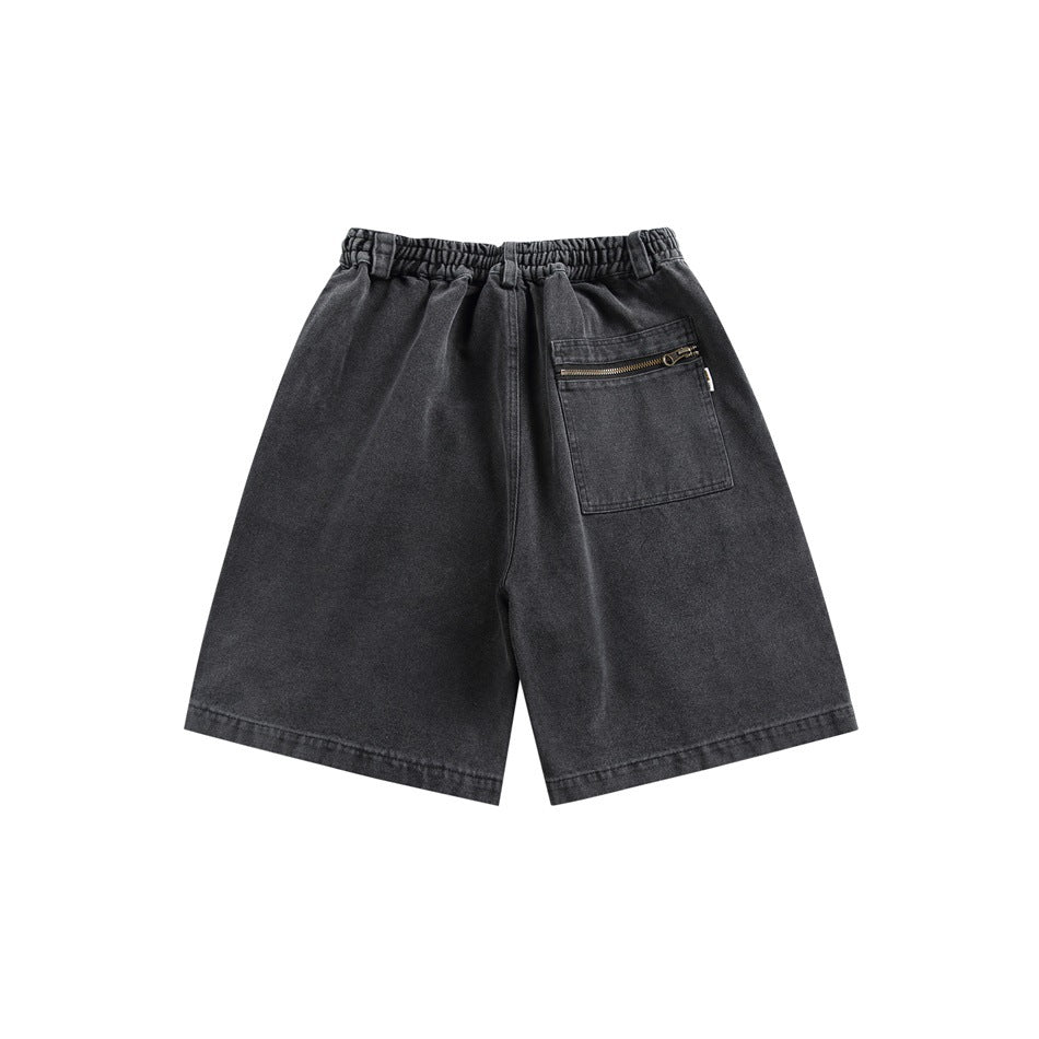 Back view of charcoal gray shorts with an elastic waistband and a zippered patch pocket.