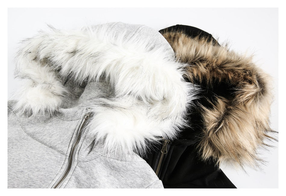 Two jackets shown together: light gray with white hood trim and black with tan-and-black hood trim.