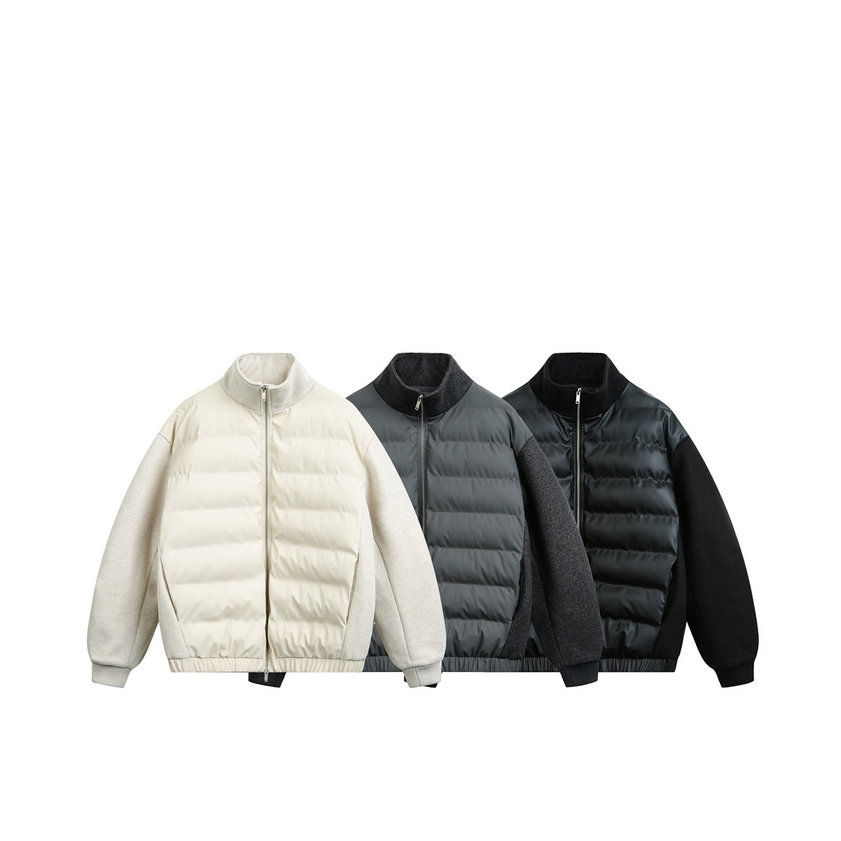Three zip jackets shown together in ivory, charcoal gray, and black colorways.
