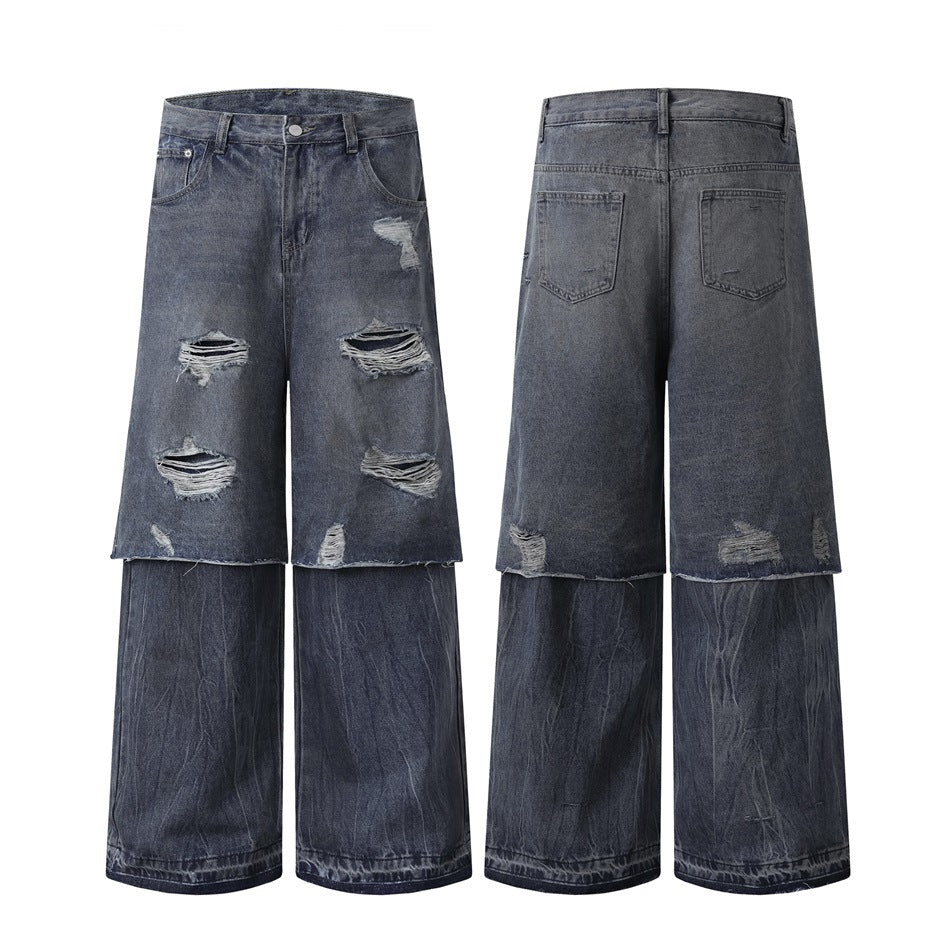 Front and back views of gray-blue wide-leg jeans with layered hems and distressed patches.