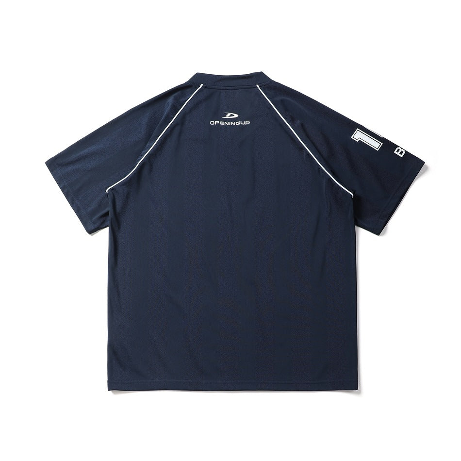 Back view of a navy short-sleeve shirt with white piping, a small upper-back logo, and sleeve lettering.