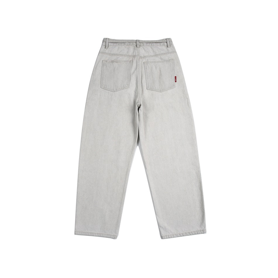 Back view of light gray wide-leg jeans with two patch pockets and a small red tab