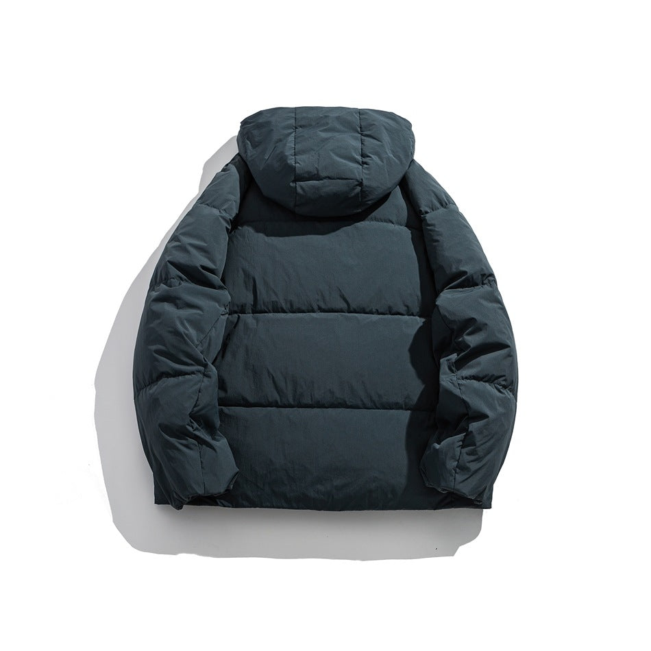 Back view of a dark teal hooded puffer jacket laid flat against a white background.
