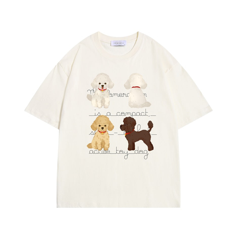 Cream short-sleeve T-shirt with four illustrated poodles and cursive lettering printed on the front