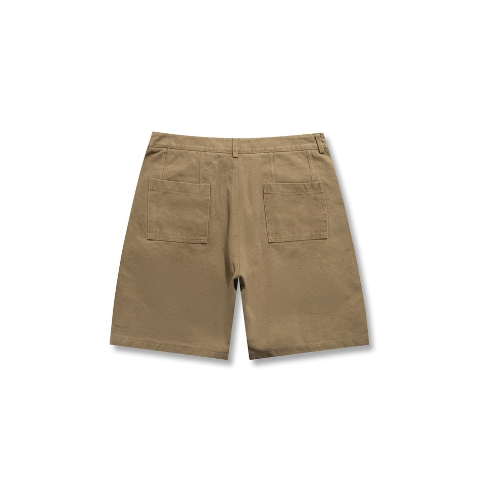 Back view of tan shorts with two square patch pockets and belt loops.
