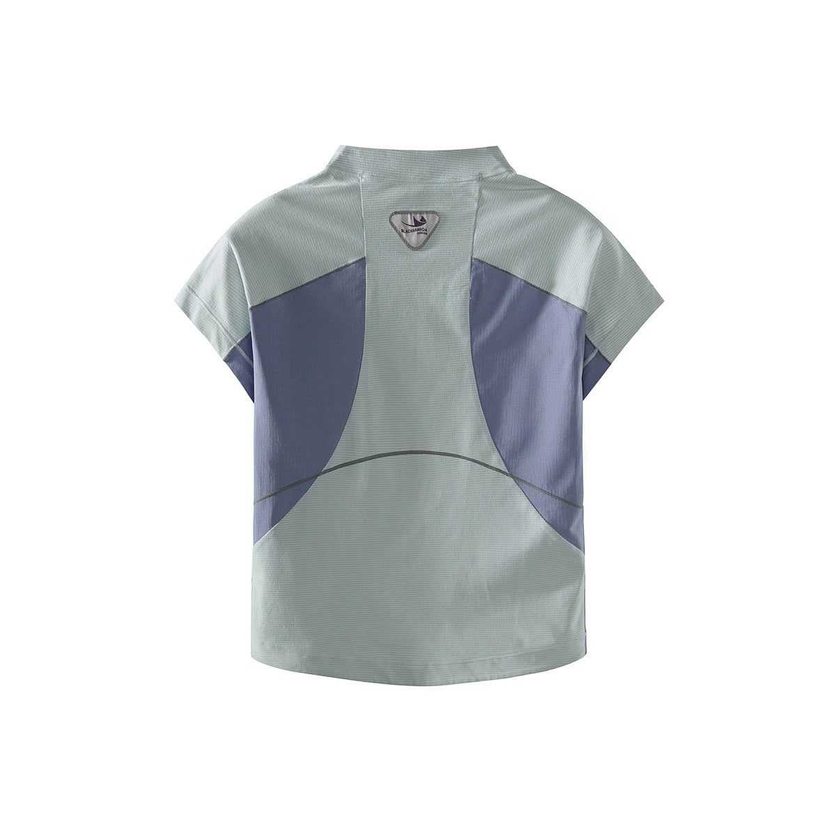 Back view of a pale gray-green short-sleeve top with lavender side panels, curved seam piping, and a small shield patch.