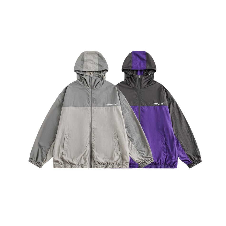 Two hooded zip jackets shown from the front: one light gray and one charcoal with purple panels.