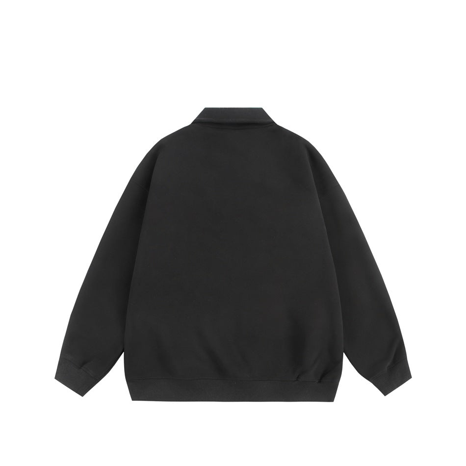 Back view of a black collared pullover with long sleeves and ribbed cuffs and hem.