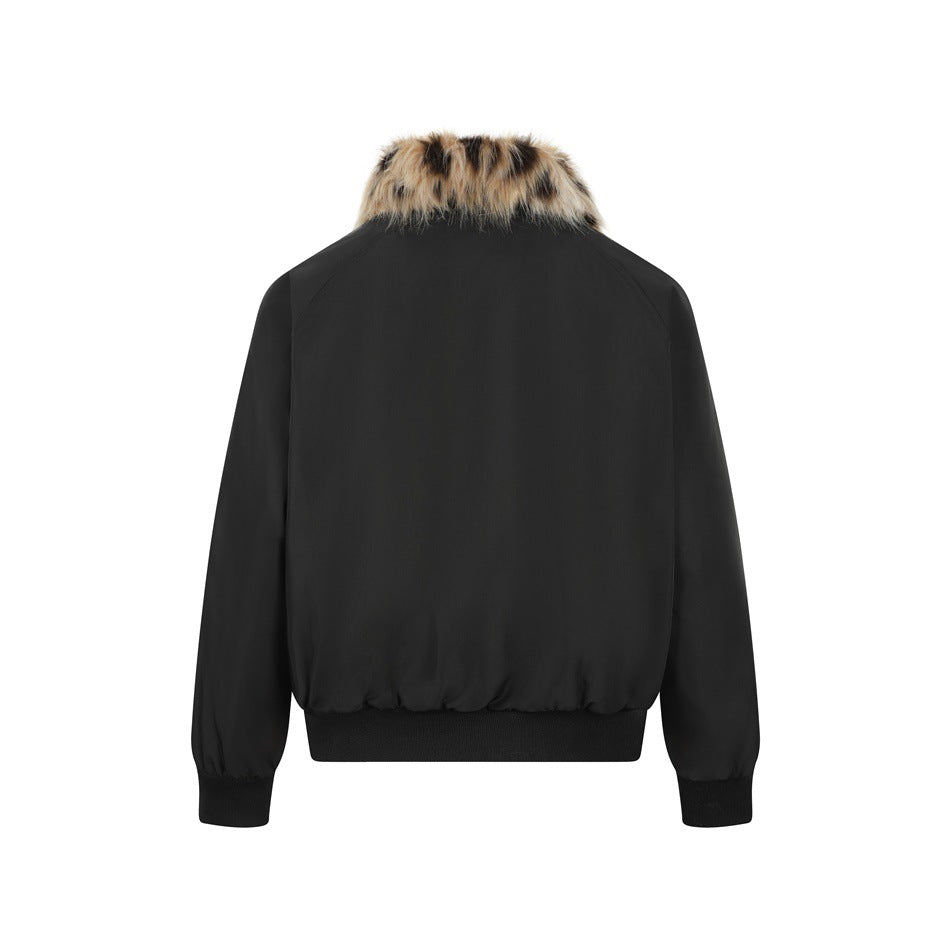 Back view of a black bomber jacket with a tan, brown, and black faux-fur collar and rib-knit cuffs and hem.