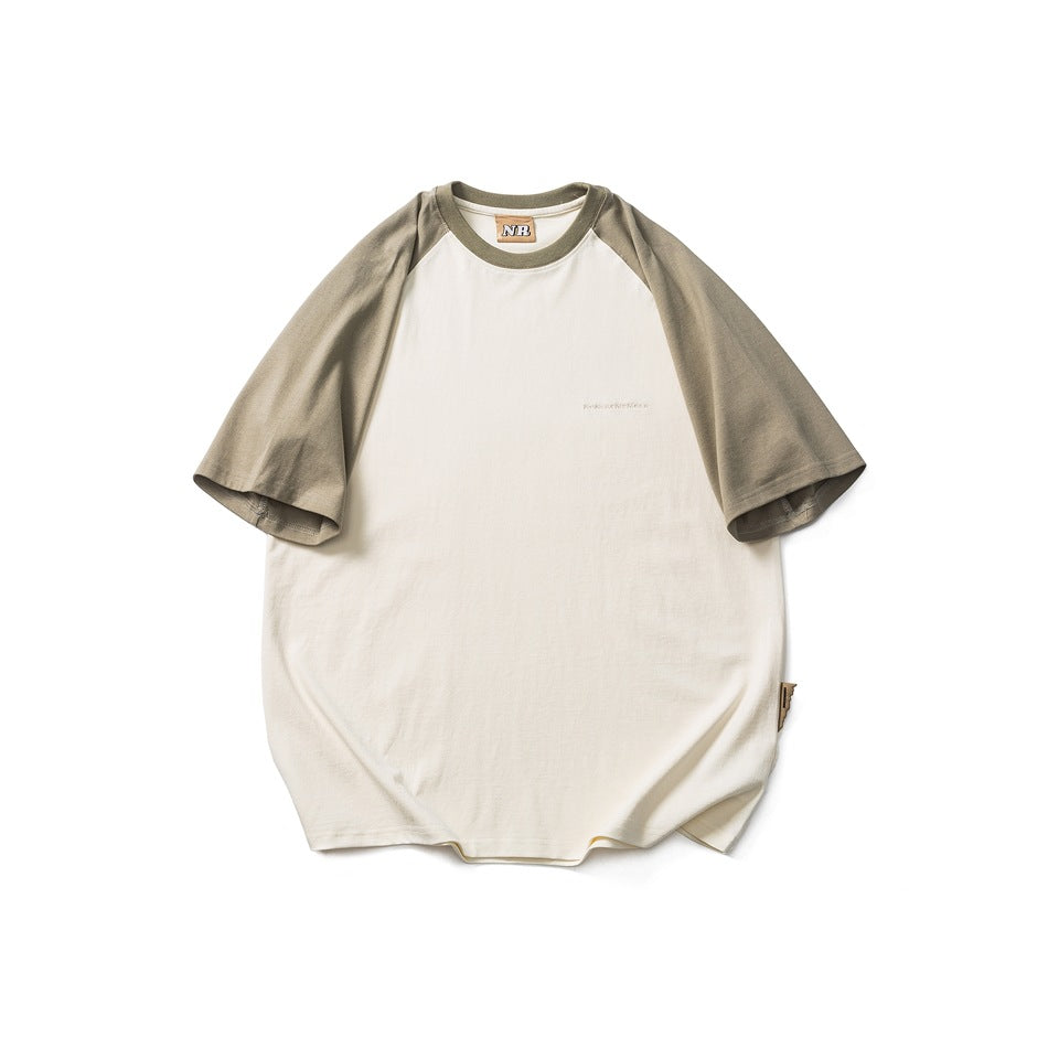 Cream raglan T-shirt with gray-green short sleeves and collar, flat lay front view