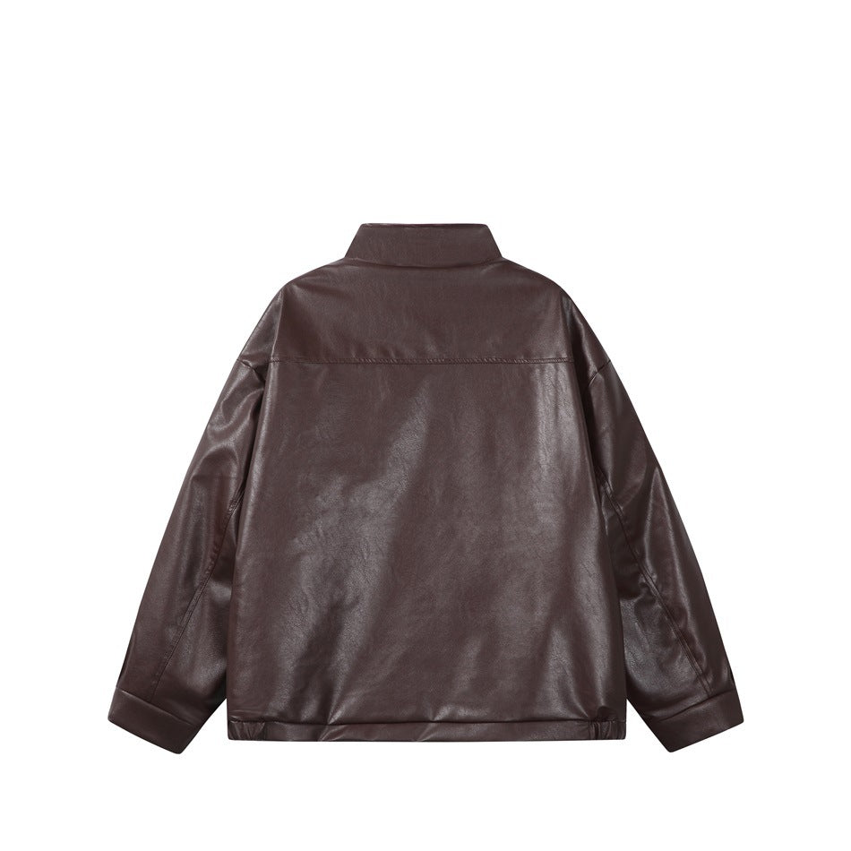 Flat back view of a dark brown jacket with a short stand collar, long sleeves, and elasticated hem.