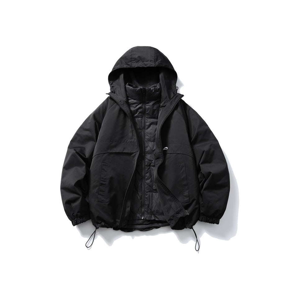 Black hooded jacket laid flat with the zipper open, showing a quilted inner layer with a stand collar