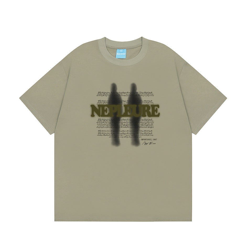 Olive green short-sleeve T-shirt with dark olive NEPLEURE print, blurred dark figures and script text, flat front view