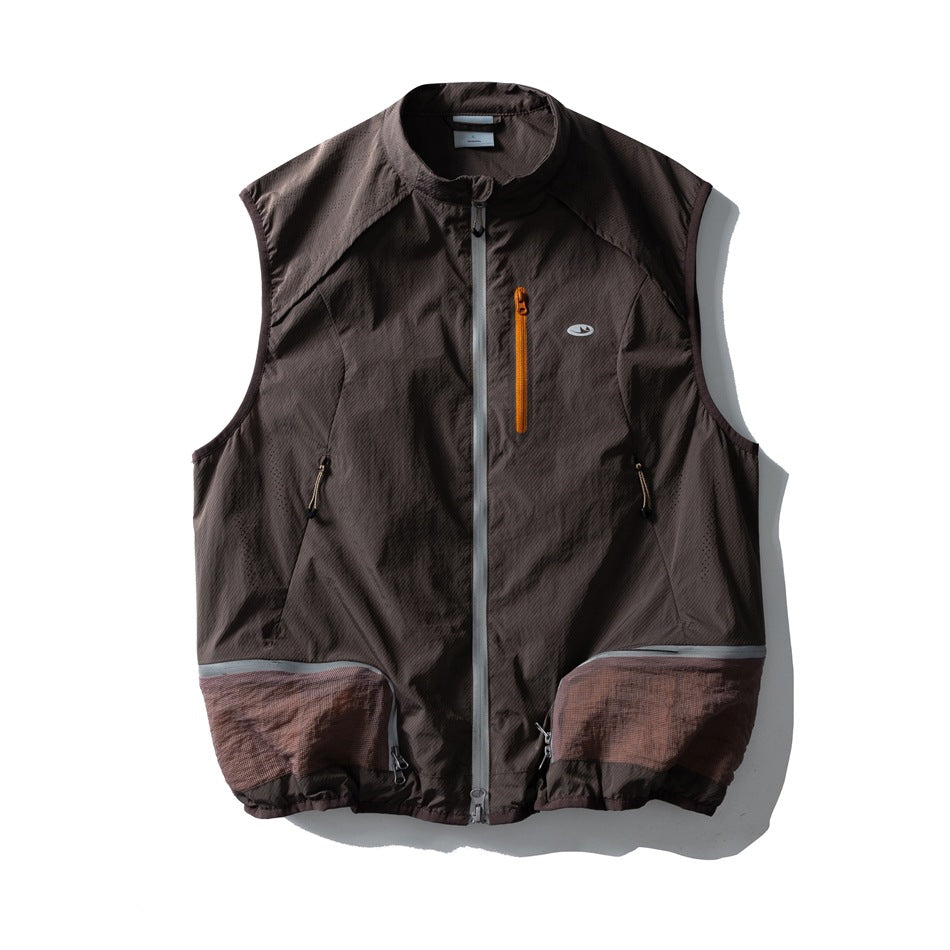 Brown sleeveless zip vest with stand collar, orange chest zip pocket and lower mesh-panel pockets, flat front view