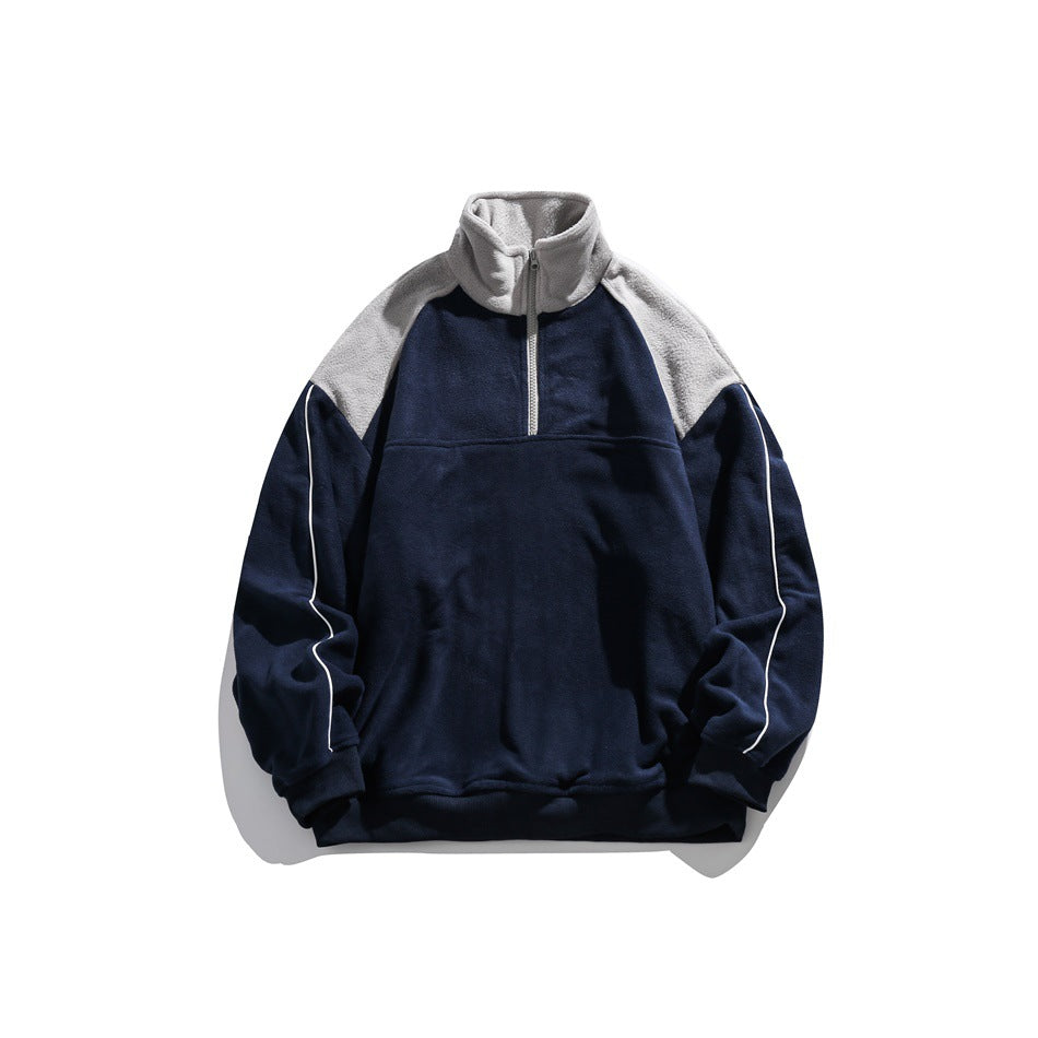 Navy half-zip fleece-texture pullover with gray collar and shoulder yoke, white sleeve piping, front view